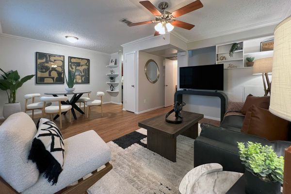 Autumn Chase apartment interior with open floor plan featuring large living room and dining area