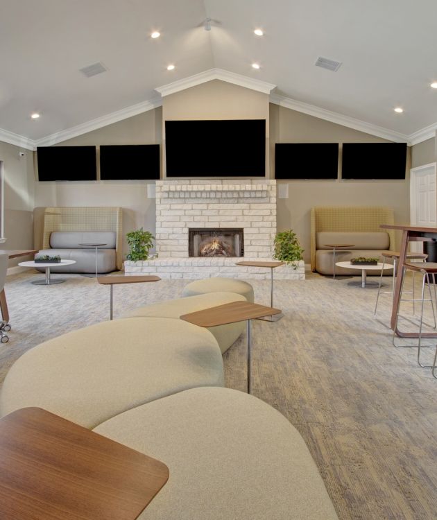The Arbors at Wolf Pen Creek community clubhouse with vaulted ceiling and high end decor