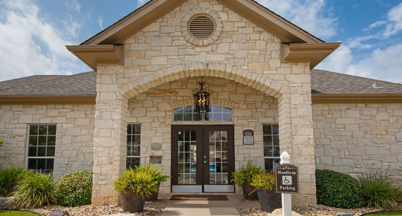 The Riviera Apartments community center exterior of building