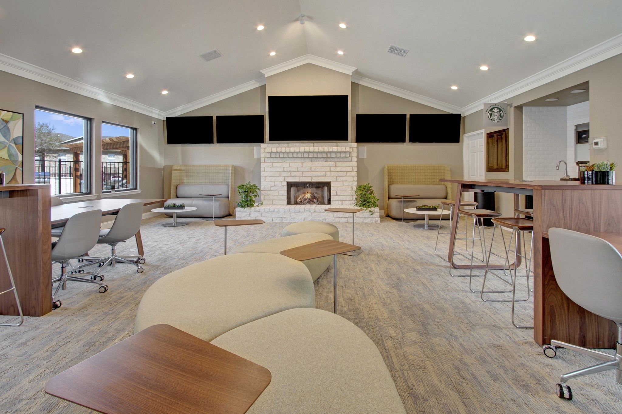 The Arbors at Wolf Pen Creek community clubhouse with vaulted ceiling and high end decor